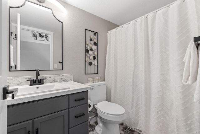530 Abby Ln Unit 5, Branson, MO 65616 - bathroom featuring vanity and backsplash