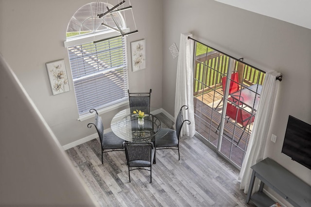 530 Abby Ln Unit 5, Branson, MO 65616 - dining room featuring wood finished floors and a chandelier