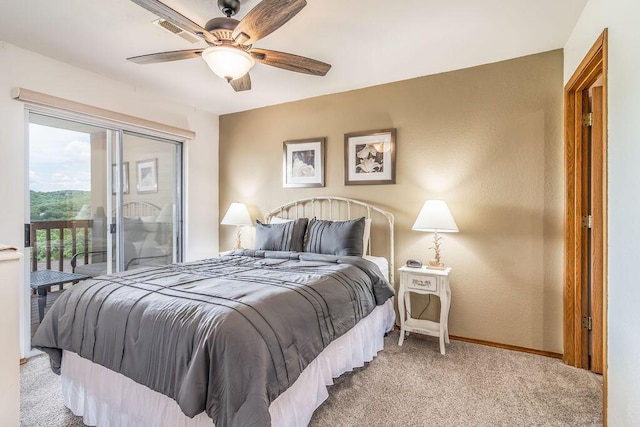 27 Blue Bird Way Unit 5, Branson, MO 65616 - carpeted bedroom with access to outside and ceiling fan