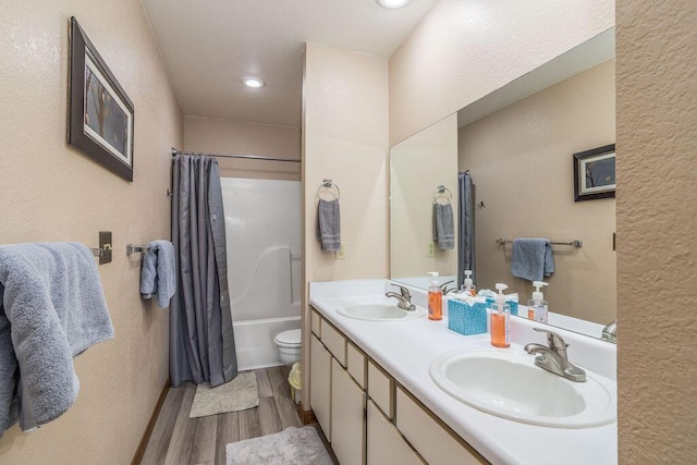 27 Blue Bird Way Unit 5, Branson, MO 65616 - full bath featuring double vanity, wood finished floors, shower / bath combo, and recessed lighting