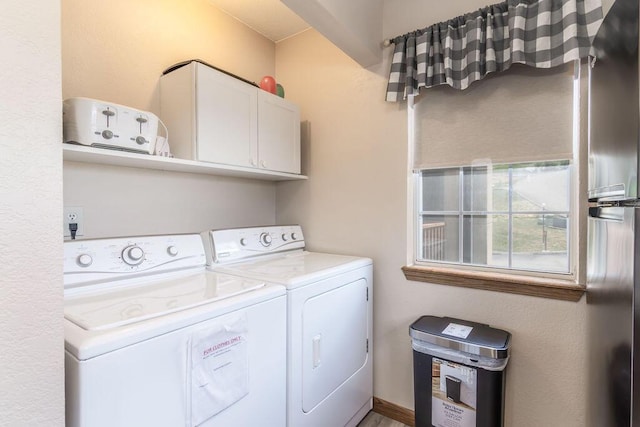 27 Blue Bird Way Unit 5, Branson, MO 65616 - washroom featuring cabinet space and washing machine and clothes dryer
