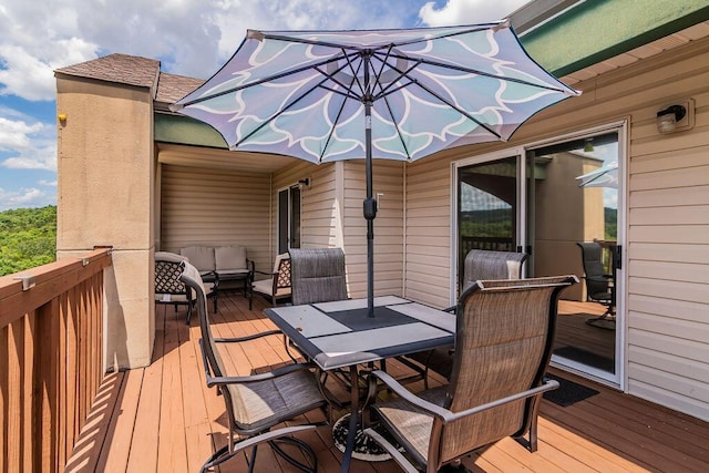 27 Blue Bird Way Unit 5, Branson, MO 65616 - wooden terrace with outdoor dining space and an outdoor hangout area