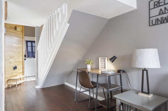 1 Memory Ln Unit 5, Branson, MO 65616 - office area with hardwood / wood-style floors, wooden walls, lofted ceiling, and a textured ceiling