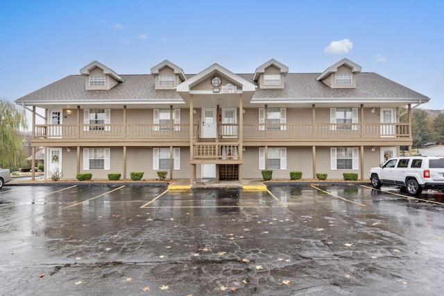 1 Memory Ln Unit 5, Branson, MO 65616 - view of front facade featuring uncovered parking and a shingled roof