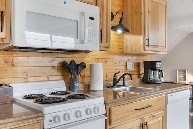 1 Memory Ln Unit 5, Branson, MO 65616 - kitchen with white appliances, light brown cabinetry, and wooden walls