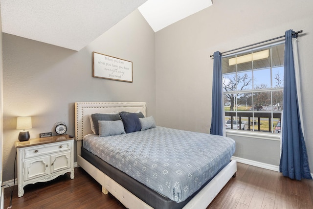 1 Memory Ln Unit 5, Branson, MO 65616 - bedroom with lofted ceiling and dark wood-style flooring