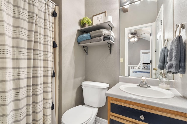 1 Memory Ln Unit 5, Branson, MO 65616 - full bath featuring a textured wall, vanity, a ceiling fan, and curtained shower