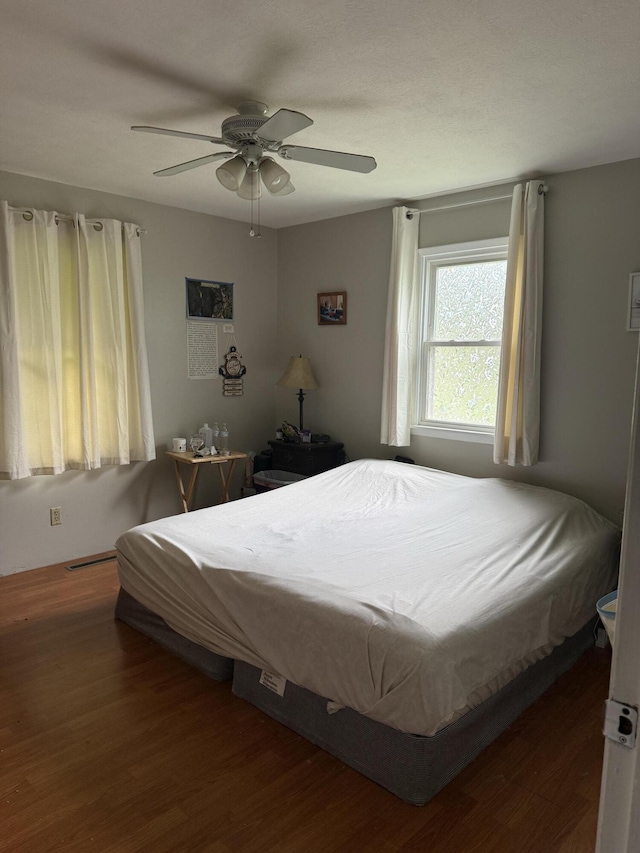 2304 E Huntington St, Ozark, MO 65721 - bedroom with wood finished floors and ceiling fan