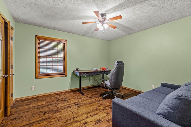 641 N Park Pl, Bolivar, MO 65613 - office area featuring wood finished floors, a ceiling fan, and a textured ceiling