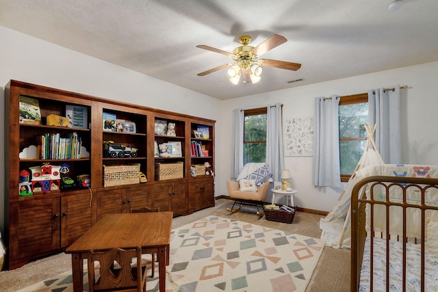 3449 S Woodstock Dr, Springfield, MO 65809 - bedroom with light colored carpet and ceiling fan