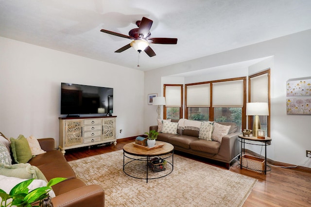 3449 S Woodstock Dr, Springfield, MO 65809 - living area with wood finished floors and a ceiling fan