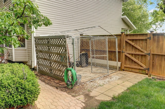 3449 S Woodstock Dr, Springfield, MO 65809 - view of patio / terrace featuring a gate