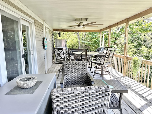 25419 County Road 327, Urbana, MO 65767 - wooden terrace featuring outdoor dining area and ceiling fan