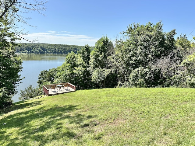 25419 County Road 327, Urbana, MO 65767 - view of green lawn featuring a deck with water view and a forest view