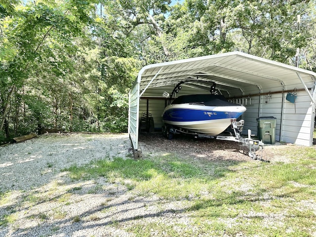 25419 County Road 327, Urbana, MO 65767 - view of parking with driveway and a detached carport