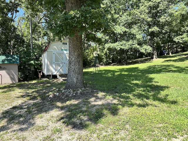 25419 County Road 327, Urbana, MO 65767 - view of green lawn with a shed