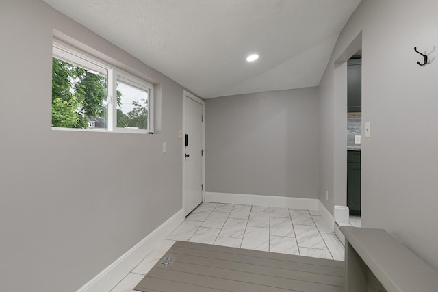 720 W Mount Vernon St, Springfield, MO 65806 - corridor featuring light marble finish flooring, recessed lighting, and lofted ceiling