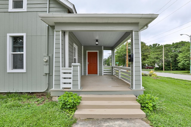 720 W Mount Vernon St, Springfield, MO 65806 - entrance to property with a porch and a lawn