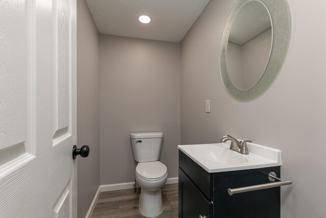 720 W Mount Vernon St, Springfield, MO 65806 - bathroom with wood finished floors, vanity, and recessed lighting