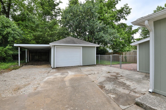 720 W Mount Vernon St, Springfield, MO 65806 - garage featuring driveway and a garage