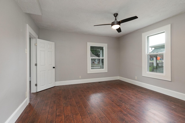 720 W Mount Vernon St, Springfield, MO 65806 - empty room with hardwood / wood-style flooring, ceiling fan, and a textured ceiling