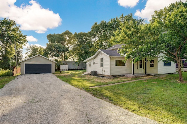 1169 S Miller Ave, Springfield, MO 65802 - view of front of property with a detached garage, a front yard, and an outdoor structure