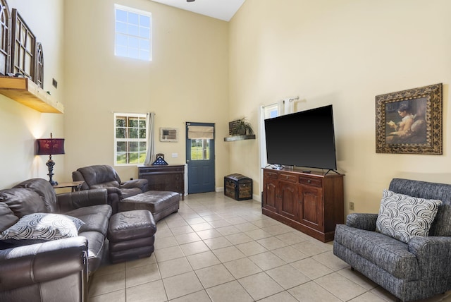 531 Plateau Dr, Marshfield, MO 65706 - living room featuring light tile patterned flooring and a towering ceiling
