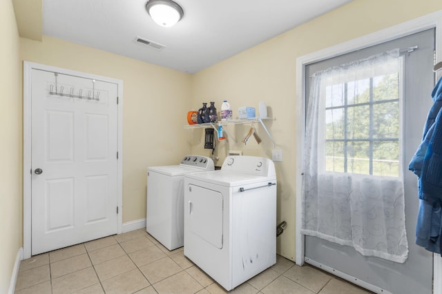 531 Plateau Dr, Marshfield, MO 65706 - laundry area featuring independent washer and dryer and light tile patterned flooring