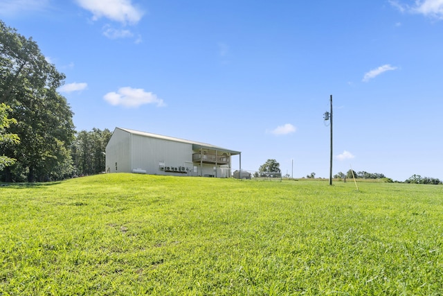 531 Plateau Dr, Marshfield, MO 65706 - view of green lawn featuring a pole building
