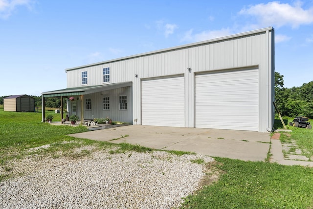 531 Plateau Dr, Marshfield, MO 65706 - view of front of property featuring a garage and a storage unit