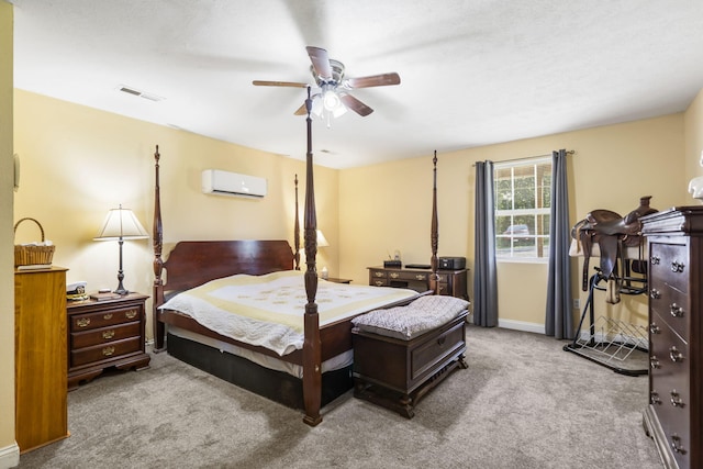 531 Plateau Dr, Marshfield, MO 65706 - bedroom featuring a wall mounted air conditioner, carpet, and ceiling fan