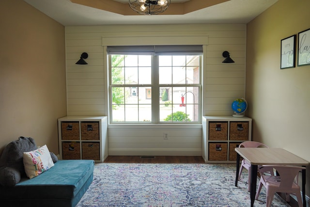 1129 S Erika Ave, Springfield, MO 65802 - sitting room with wood finished floors and wooden walls