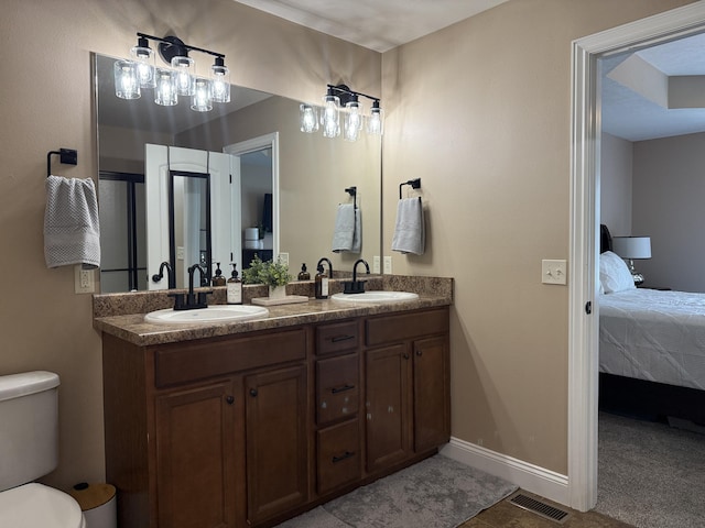 1129 S Erika Ave, Springfield, MO 65802 - bathroom with connected bathroom and double vanity