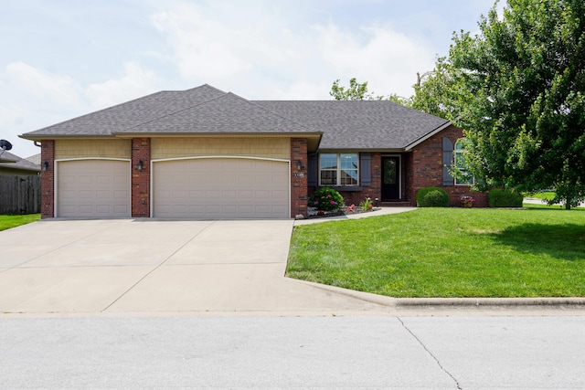 1129 S Erika Ave, Springfield, MO 65802 - ranch-style home with a front lawn, an attached garage, brick siding, and concrete driveway