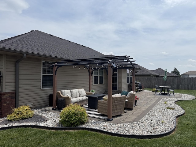 1129 S Erika Ave, Springfield, MO 65802 - back of property with an outdoor living space, a pergola, a shingled roof, and a patio area
