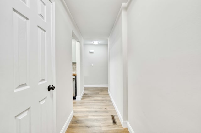 210 N Cedarbrook Ave, Springfield, MO 65802 - corridor featuring light wood finished floors and baseboards