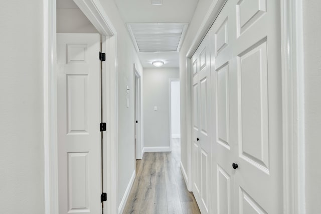 210 N Cedarbrook Ave, Springfield, MO 65802 - hallway featuring light wood-style floors and baseboards
