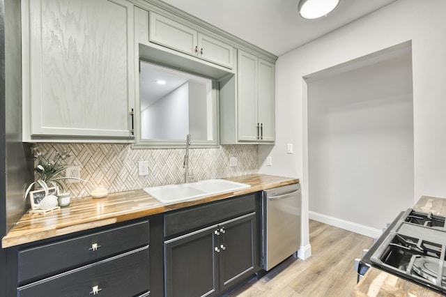 210 N Cedarbrook Ave, Springfield, MO 65802 - kitchen with wood counters, dishwasher, gas stove, light wood-style flooring, and tasteful backsplash