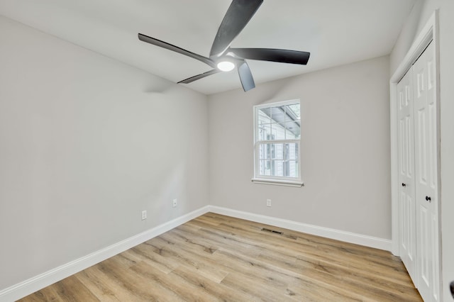 210 N Cedarbrook Ave, Springfield, MO 65802 - unfurnished bedroom featuring a closet, light wood-style floors, and a ceiling fan
