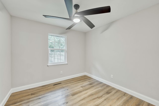 210 N Cedarbrook Ave, Springfield, MO 65802 - spare room with wood finished floors and a ceiling fan