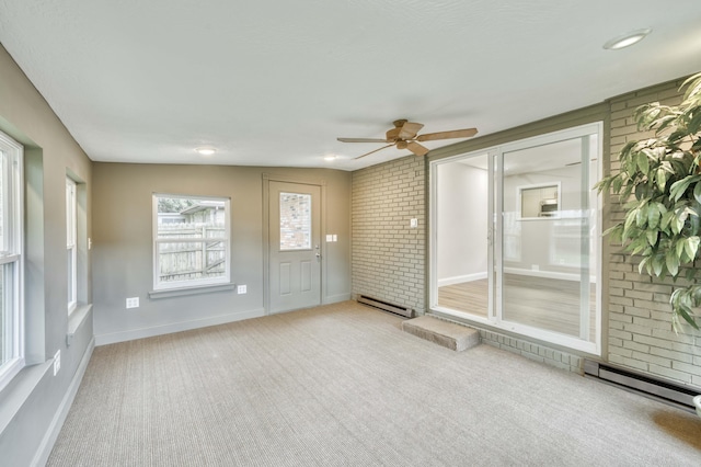 210 N Cedarbrook Ave, Springfield, MO 65802 - unfurnished sunroom featuring a baseboard radiator