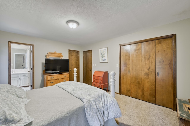 1820 E Jacqueline St, Springfield, MO 65804 - carpeted bedroom with a textured ceiling and ensuite bath