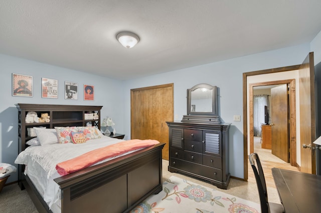 1820 E Jacqueline St, Springfield, MO 65804 - bedroom with light colored carpet and a textured ceiling