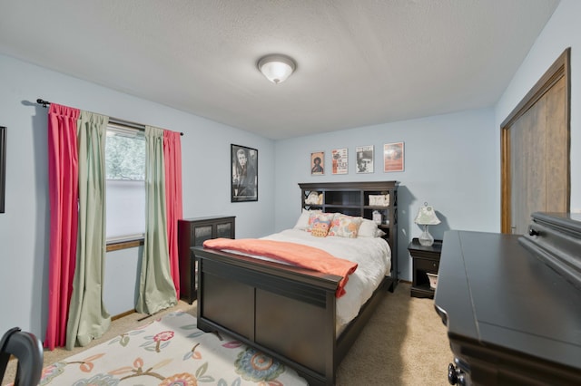 1820 E Jacqueline St, Springfield, MO 65804 - bedroom featuring light colored carpet and a textured ceiling