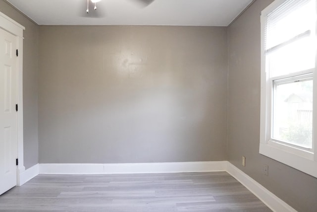 1019 N Clifton Ave, Springfield, MO 65802 - unfurnished room with light wood-style floors and baseboards