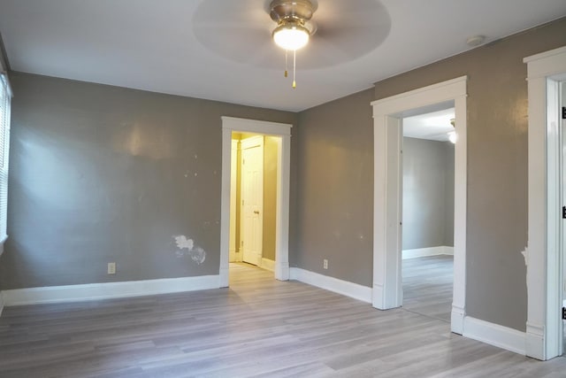 1019 N Clifton Ave, Springfield, MO 65802 - empty room featuring ceiling fan, wood finished floors, and a smoke detector