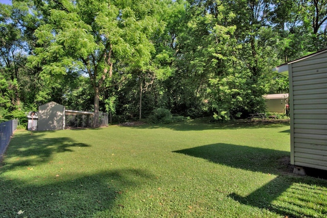 2431 N Kellett Ave, Springfield, MO 65803 - view of yard featuring a shed