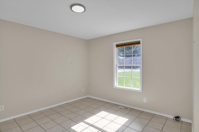 2431 N Kellett Ave, Springfield, MO 65803 - spare room featuring light tile patterned floors