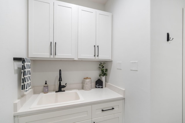 858 E Edenmore Cir, Nixa, MO 65714 - kitchen with white cabinetry and light countertops