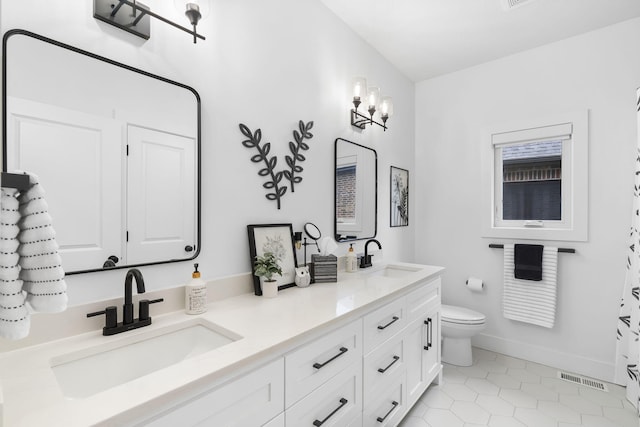 858 E Edenmore Cir, Nixa, MO 65714 - full bath featuring double vanity and tile patterned flooring